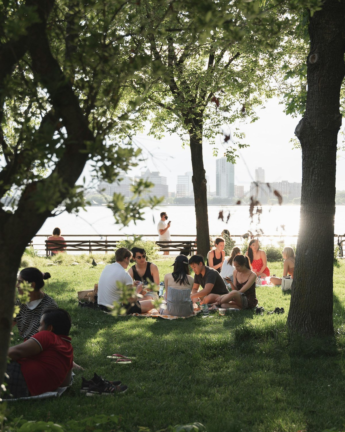 Friends relaxing on the grass in a park