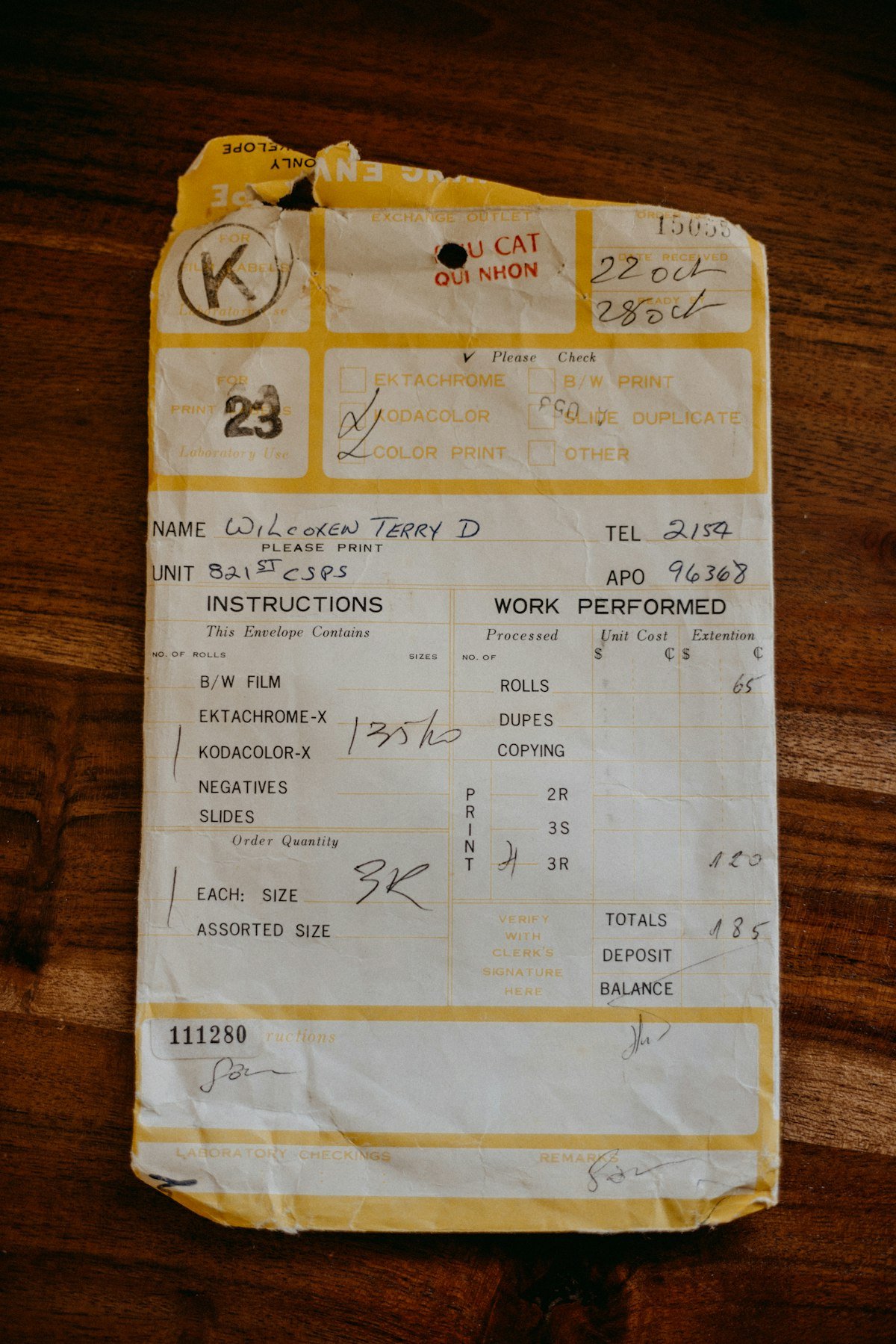 A receipt on a wooden table